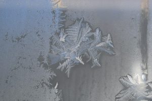 Pretty ice patterns formed on the glass